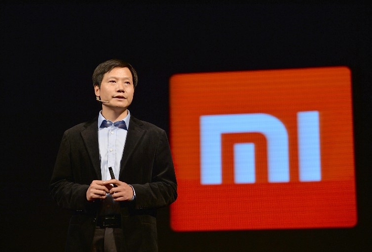 Lei Jun, Chairman and CEO of Xiaomi Technology and Chairman of Kingsoft Corp., delivers a speech at a forum in Chengdu city, southwest China's Sichuan province, 31 October 2014. Chinese smartphone manufacturer Xiaomi continued to dominate the country's smart phone market as two of the company's models topped the sales charts in the third quarter. The company secured 30.3 per cent of the market share in China, followed by Samsung with an 18.4 per cent share in three months ending September, UK-based market research company Kantar Worldpanel Comtech said. Xiaomi shipped 18 million units of smartphones in the third quarter, an increase of 18 per cent from the previous quarter, the company's founder and CEO Lei Jun recently posted on his Sina Weibo microblog, state-run Xinhua news agency reported. Pushed by Xiaomi's strong sales, Lei took eighth with $US9.1 billion of personal wealth on the 2014 Forbes China Rich List.